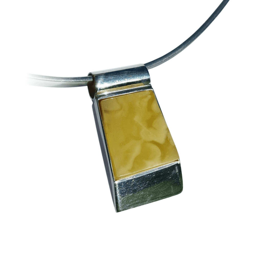 a necklace with a yellow pendant