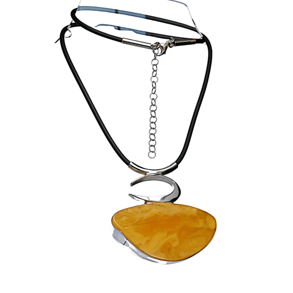 a necklace with a yellow pendant