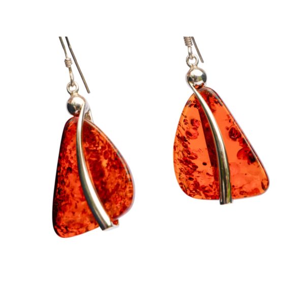 COGNAC AMBER AND SILVER TWIST SET: Triangular earrings in a rich cognac amber color with silver accents and an elegant hook design.