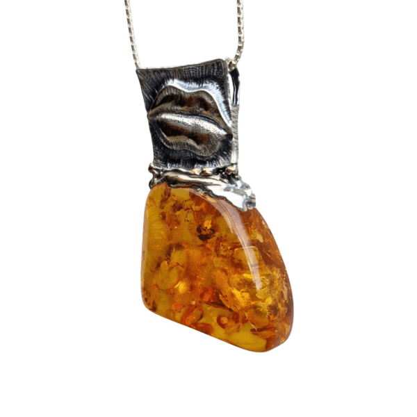 a amber necklace on a white background