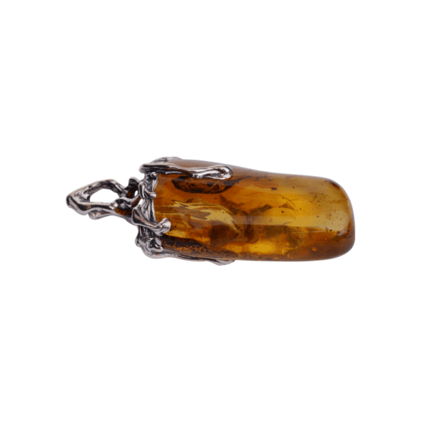 a amber pendant with a silver frame