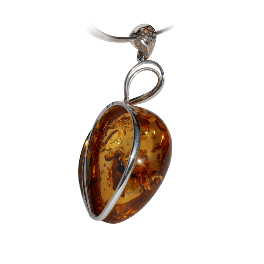 a amber pendant on a white background