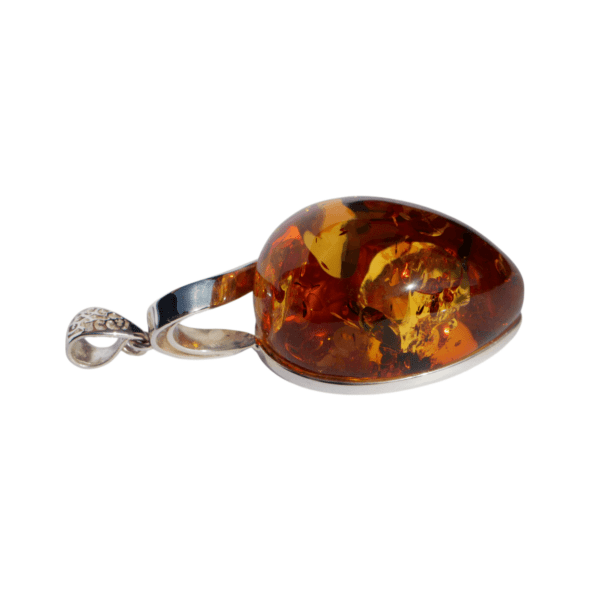 a amber pendant with a silver band