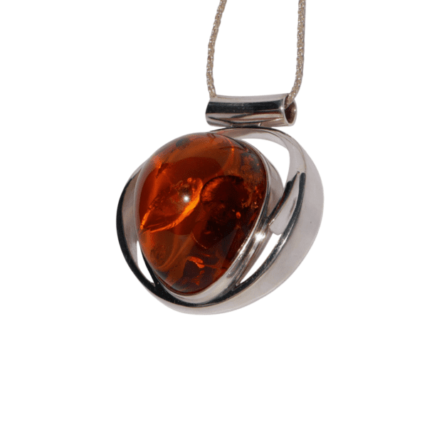 a amber pendant on a necklace