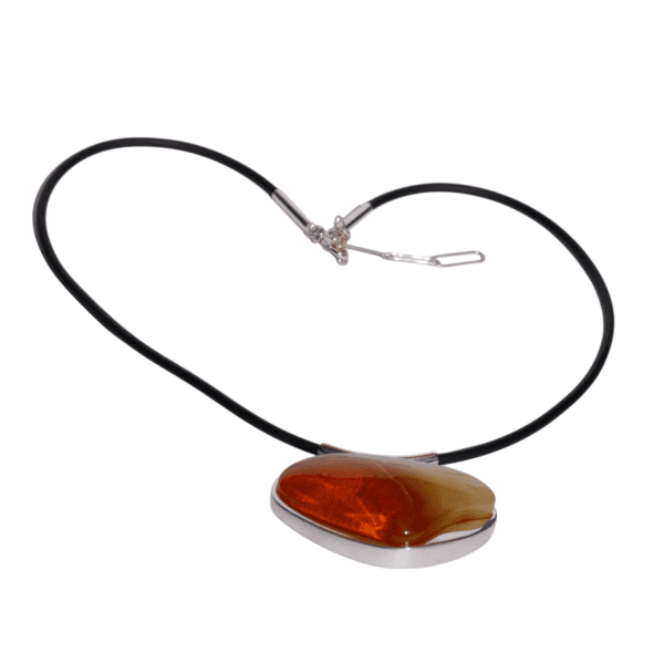 a necklace with a amber stone