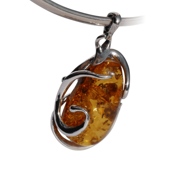 a amber pendant on a silver necklace