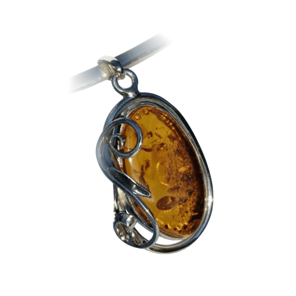 a amber pendant on a white background