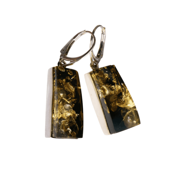 a pair of earrings with gold and black rectangles