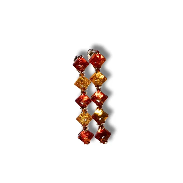 Geometric amber earrings with a refined sterling silver setting, featuring warm amber tones